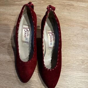Phyliss Poland red heels